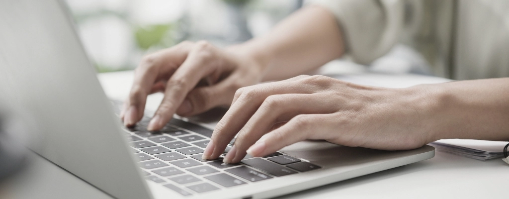 client booking a ride online using a laptop